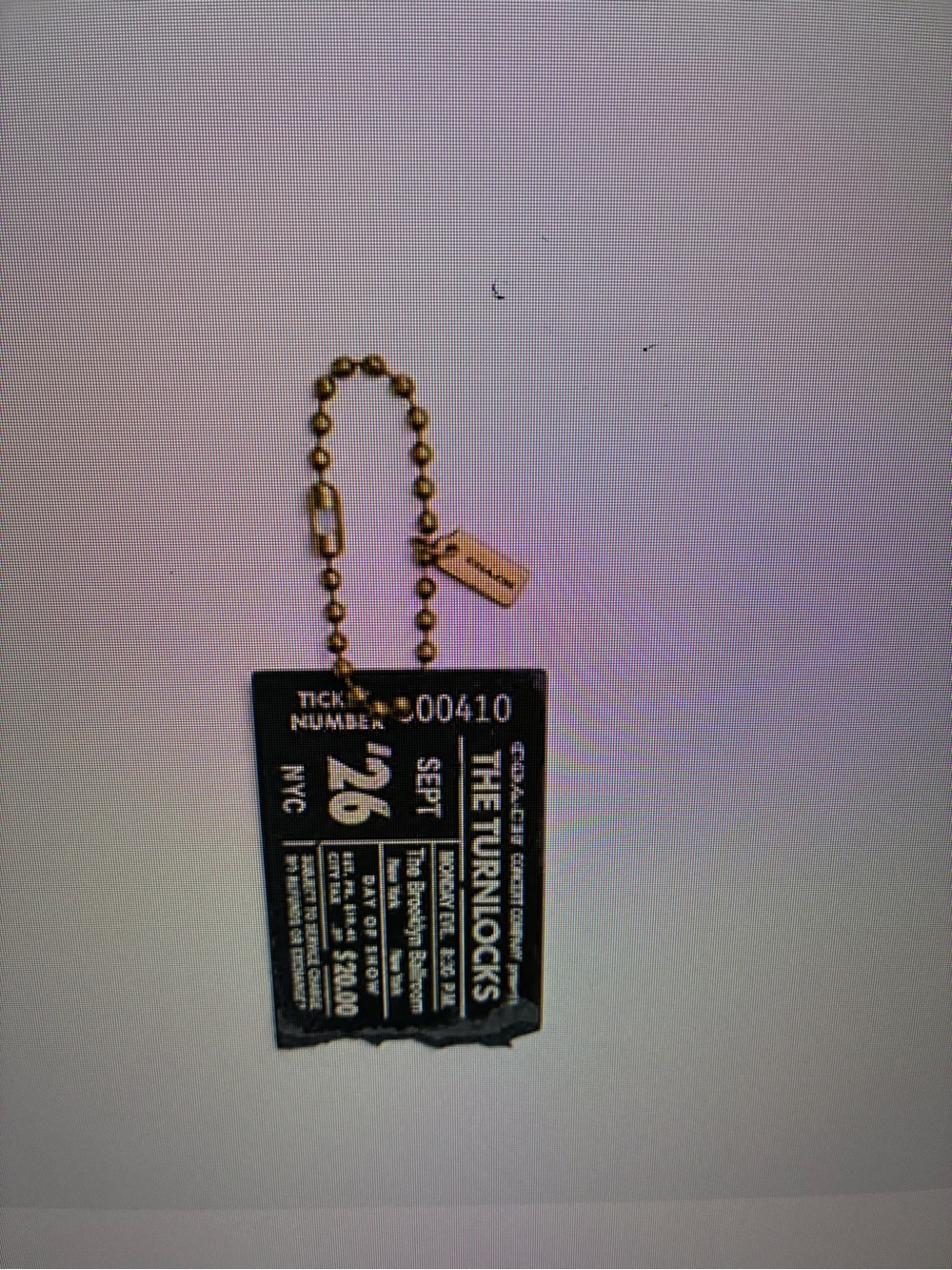 The Coach bag charm NWT